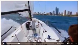 J/70 sailing fast off Chicago waterfront