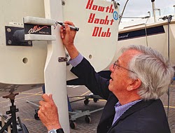 Bob Johnstone of J/Boats signing a J/24 in Ireland